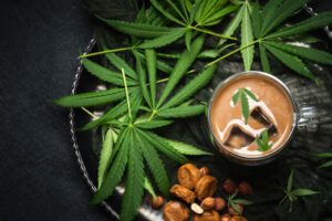 Cannabis-iced-coffee-in-a-bowl-with-marijuana-leaves-and-caramels.