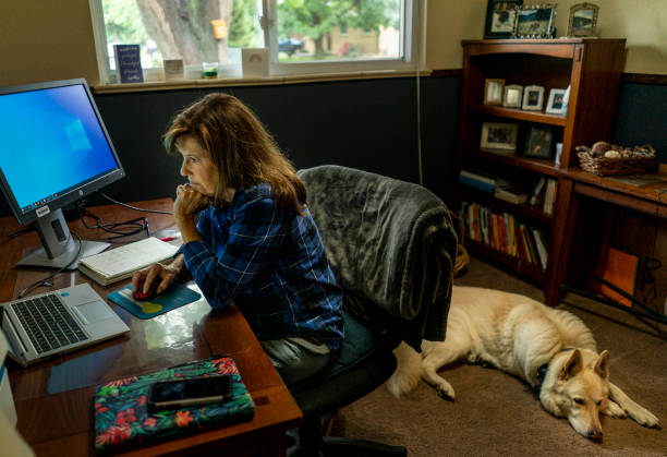 Employee-working-from-home-with-her-dog