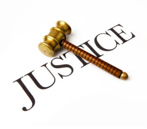 Gavel-over-the-word -'justice'