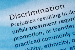 The-Discrimination-highlighted-in-a-blue-toned-image.