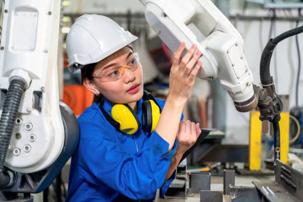 woman-and-robotic-arm-working-together