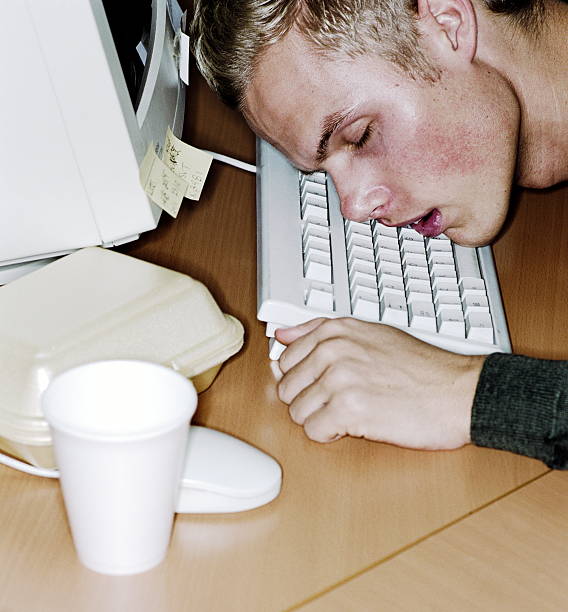 Employee-asleep-on-the-computer.-What-Does-it-Mean-to-Disconnect-from-Work.