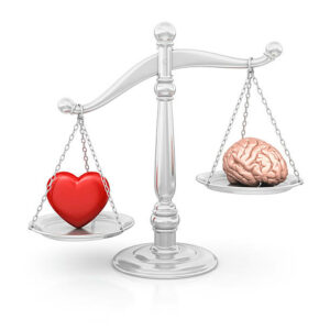 Scales-of-justice-with-a-heart-on-one-side-and-a-brain-on-the-other.