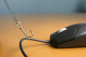Fish-hook-attached-to-a-computer-mouse